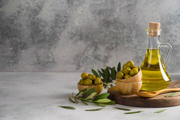Green olive with olive oil bottle