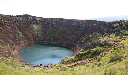 Fototapeta na wymiar Kerid is a beautiful crater lake of a turquoise color located on the South-West of Iceland