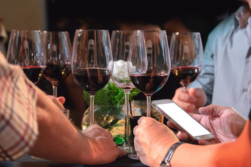 elder people have chatting in night party with wine glass