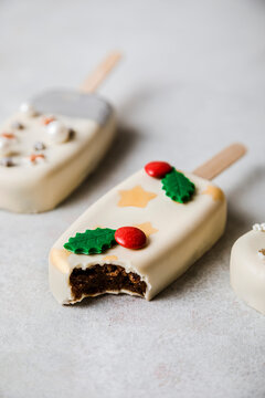 Christmas decorated cake pop with missing bite
