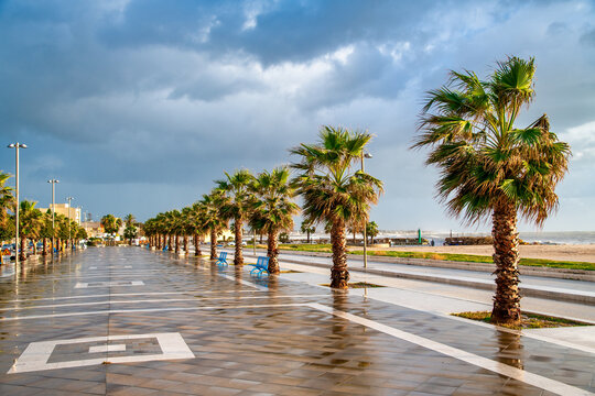 Lungomare of Mazara del Vallo at sunset. Boulevard along the ocean.