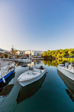 Greece, Crete, Sissi, Boats moored in marina of coastal village