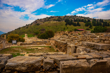Fototapeta na wymiar EPHESUS, TURKEY: Agora is the central square and ruins of the ancient city of Ephesus.