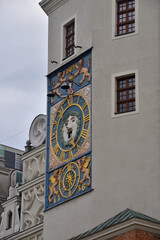 Historic clock on the facade of a historic building