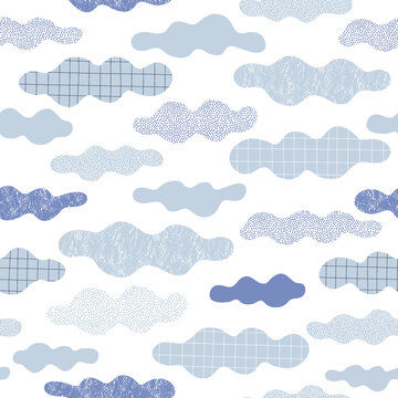 Whimsical clouds in clear sky vector seamless pattern. Childish cloudy skies white background. Scandinavian decorative surface design for nursery and kids fabric.