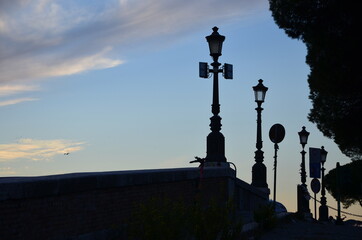 Fototapeta premium Some photos from the Eternal City of Rome, Italy, taken while strolling across the city centre and over the river Tiber on a sunny Fall day, with Rome's typical churches, bridges and statues