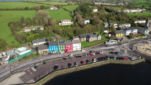 Aerial View, Bantry Town, Ireland. Colorful Houses, Streets and Green Landscape by Bay on Sunny Day Drone Shot