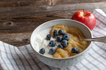 Grain free breakfast bowl with skyr, homemade applesauce and fresh blueberries