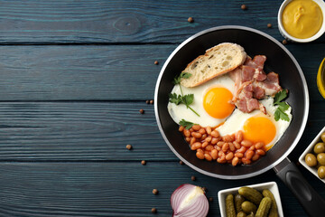 Concept of tasty breakfast on wooden background