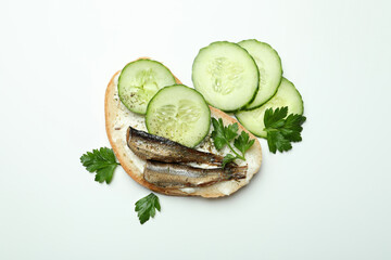 Delicious sandwich with sprats on white background