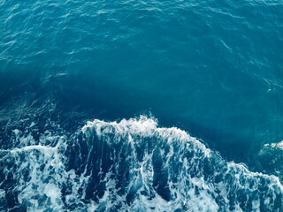 azure sea waves seethe and foam, Alanya, Turkey