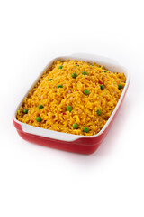 Traditional Mexican rice served with green peas isolated on white background	
