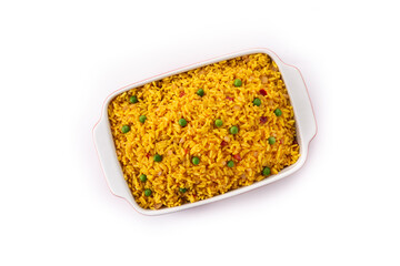 Traditional Mexican rice served with green peas isolated on white background	
