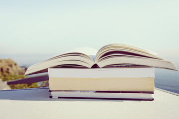 Open book outdoors. Reading