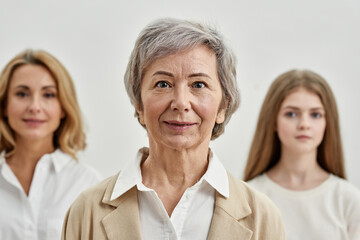 Senior woman before her daughter and granddaughter