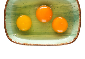  egg yolk and white in the plate