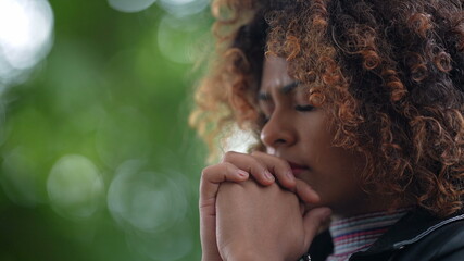 Spiritual woman praying to God