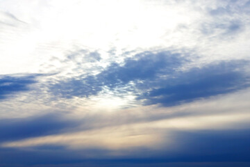 Cirrus and cumulus clouds on a beautiful landscape sky at sunset in late autumn or early winter in...