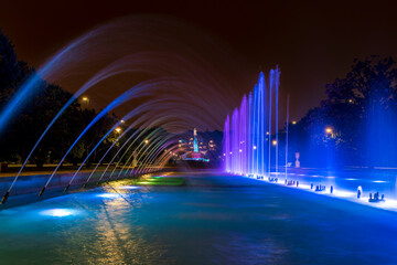 Fountain with water jets illuminated at night in the fountain of the Jose Antonio Labordeta public...