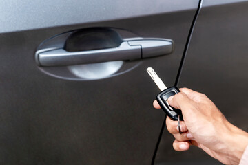 Close up view of hand holding a remote key