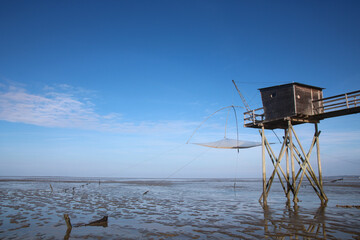 Tout au long de la côte se dresse des esplanades en bois, souvent agrémentées d’une cabane sur...