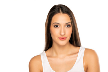 portrait of a young woman with long black hair on a white