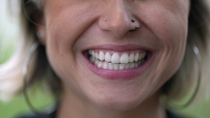 Happy woman close-up lips smiling and laughing, talking in conversation