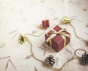 Eco friendly Christmas composition with gift boxes in craft reusable paper and natural decor on paper background top view. Zero waste environmentally friendly Christmas concept. Long banner format.