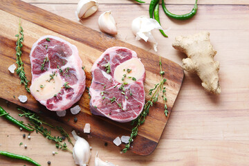 close up of raw meat on chopping board on a chopping board 