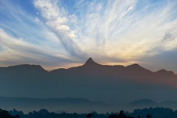 As the Sun rises over Sri Lanka, the view of Sri Pada or Adam's Peak mountain can be seen across the entire island nation