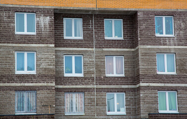 new multi-storey houses built of brick, and multiple windows