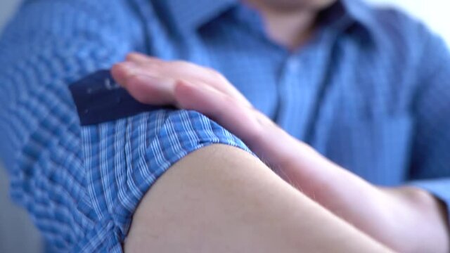 Manager rolls up his sleeves before work. High quality FullHD footage