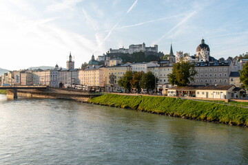 Fototapeta premium The first Sunbeams of a day over Salzburg