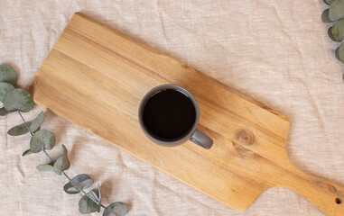 filter coffee cup and empty space on wooden table, top view style