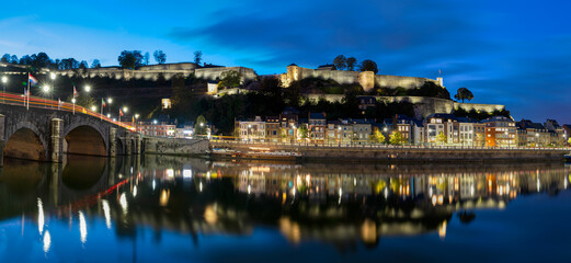 Fototapeta na wymiar Panoramic Namur Citadel with Meuse river and the bridge in the evening. Namur, Belgium.