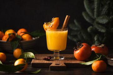 Persimmon and tangerine juice bourbon cocktail