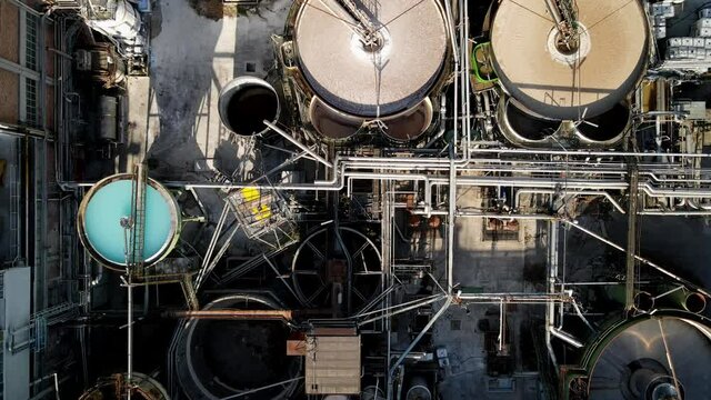 A top view of Monfalcone industrial buildings connected with metal roots