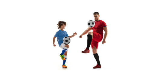 Sport collage. Man, professional soccer player and little boy training together isolated over white studio background
