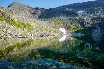 Naklejka na ściany i meble Beautiful mountain lake in the Ergaki nature reserve