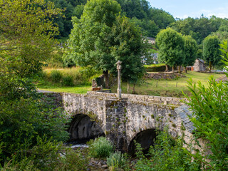 Old stone bridge on the Way of St. James in Central France