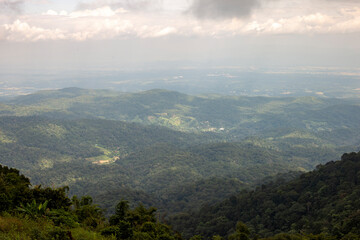 View of mist forest mountain and sky