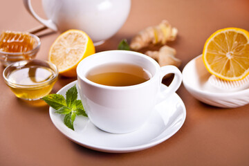 Refreshing ginger tea with lemon, mint leaf and honey