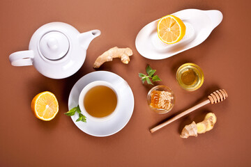 Refreshing ginger tea with lemon, mint leaf and honey
