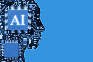 Human head outline revealing electronic circuit board with microchips, blue background, copy space....