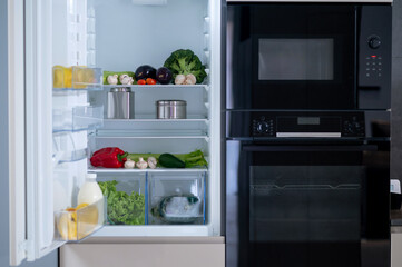 Picture of the fridge with food inside