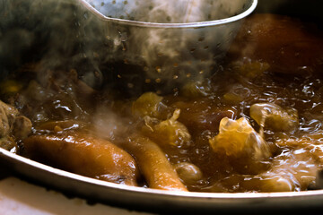 Close up of traditional Mexican carnitas tacos process 
