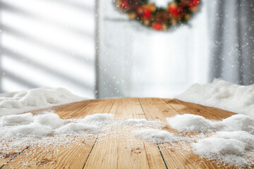 Wooden table with snow, free space, winter background