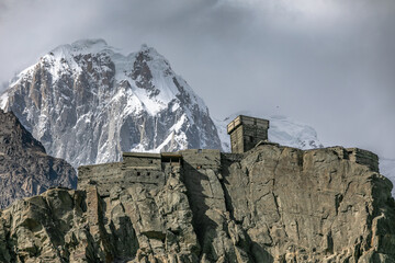 Ancient fort on the edge of the rock mountain landscape. Pakistan. High quality photo