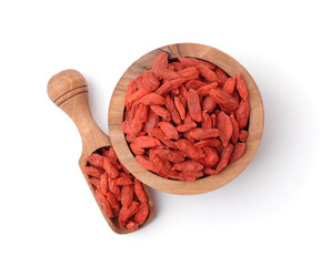 Top view of goji berries in wooden bowl and scoop