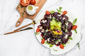 beet carpaccio with feta, arugula and olive oil. banner, menu, recipe place for text, top view